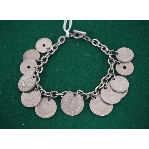 294 - Hallmarked silver coins on bracelet