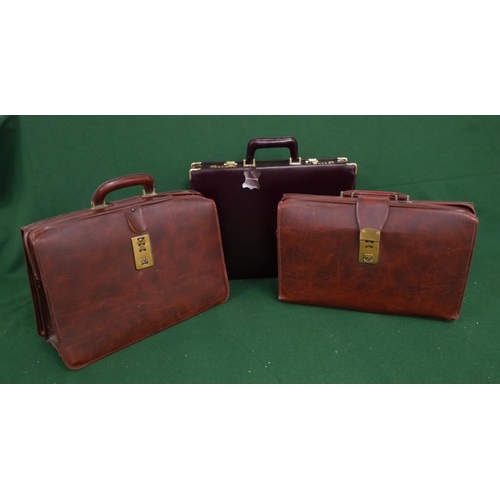 394 - 3 Old leather brief cases