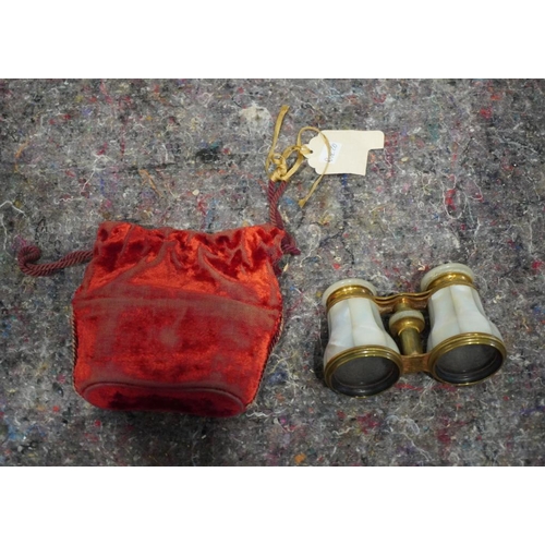 446 - C1930's French mother of pearl binoculars in original red velvet case