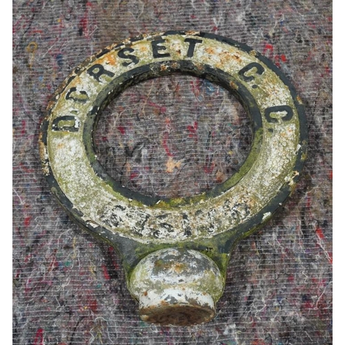 502 - Cast iron circular double sided Dorset CC sign