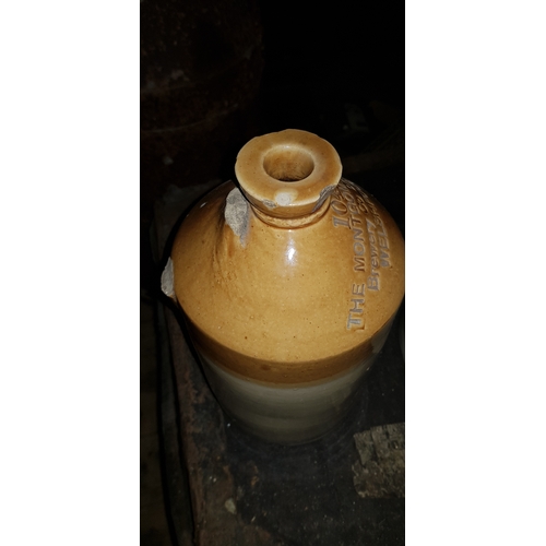 584 - 7 Assorted stoneware jars including Montgomeryshire brewery