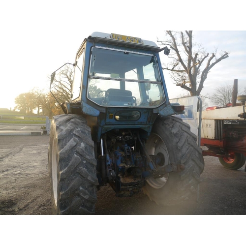 144 - Ford 8100 tractor. Runs and drives. 6585Hrs recorded. In recent use. Reg. UVL 697W.