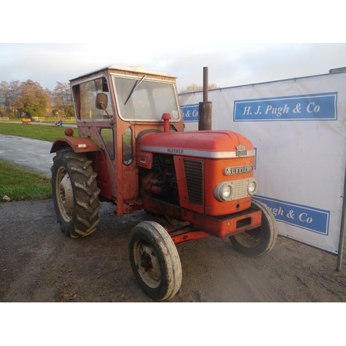 144A - Nuffield 3/45 tractor with Duncan cab. Runs. 3119hrs recorded. Reg. PBX 462J. V5