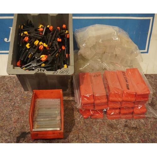 204 - Approx 65 packs of Stanley knife blades, box of plastic clamps and assorted plastic cases +VAT