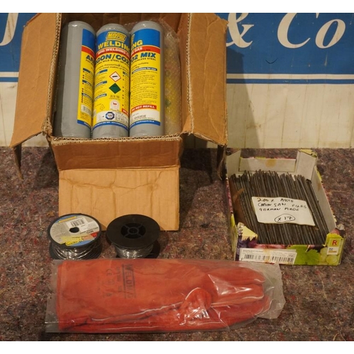 206 - Box of Argon/CO2 welding gas, welding wire, gauntlets and box of chainsaw files