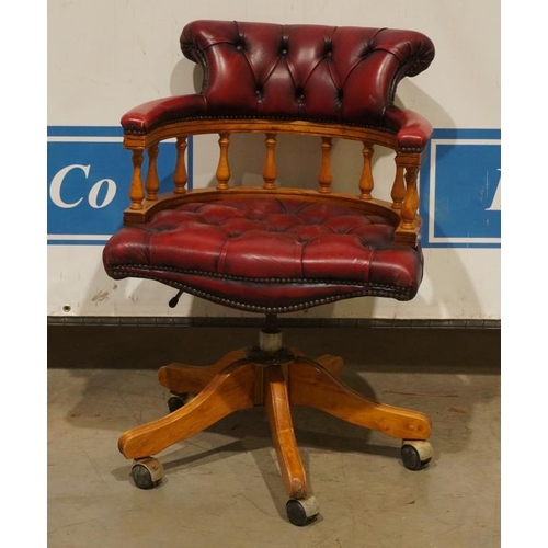 103 - Red leather button back captains chair on wheels