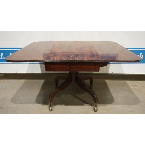 145 - Mahogany drop leaf table on pedestal base with casters 52x43