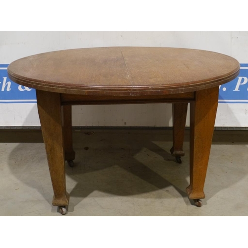 203 - Oak circular wind out table, missing winder 48