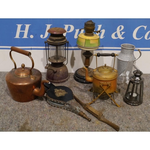 232 - Paraffin lamps, copper kettles, bellows and other items