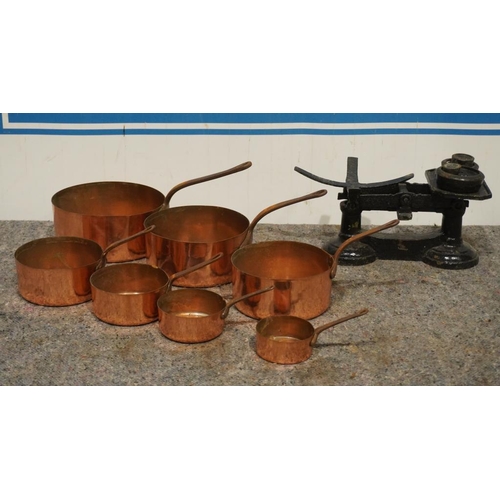 235 - Set of 7 copper pans and set of scales