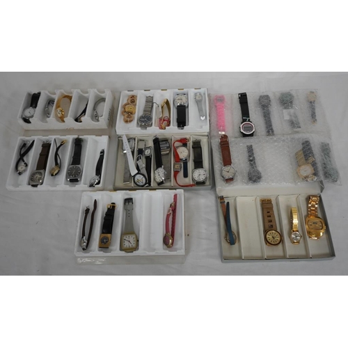 306 - Large quantity of assorted watches including Casio, Alba, Orion etc