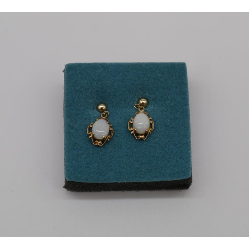 440 - Pair of 9ct gold and opal earrings