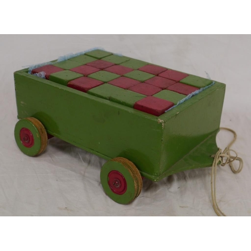 493 - Childs pull along trolley and building blocks