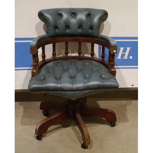 66 - Blue leather buttton captains chair