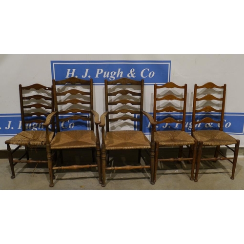 75 - 2 Rush seated ladder back arm chairs and 3 rush seated ladder back dining chairs