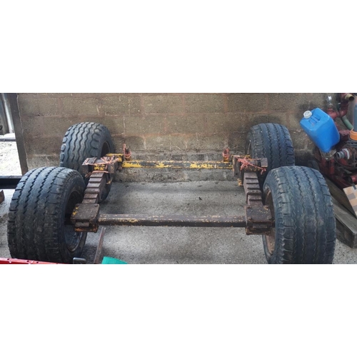 35 - Two trailer axles and wheels