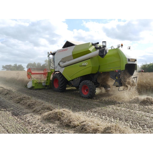 79 - 2009 Claas Tucano 430 combine, straw walker, straw chopper, new to farm and only two drivers, dealer... 