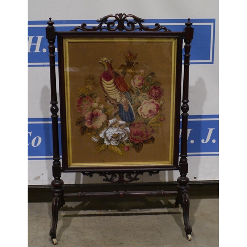 148 - Victorian tapestry fire screen in mahogany frame on casters 31x48