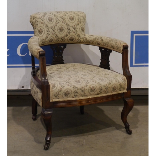 149 - Upholstered arm chair on casters