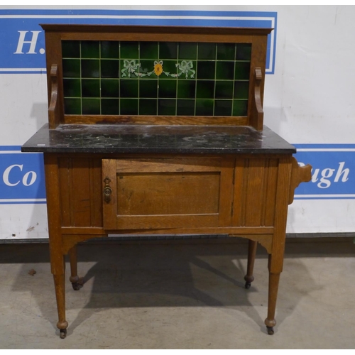 157 - Marble top dressing table with tile back on casters 45x36
