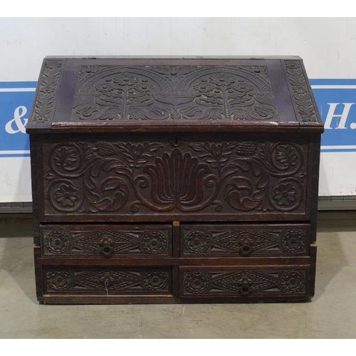 184 - Heavily carved oak desk with 4 drawers 28x35x20