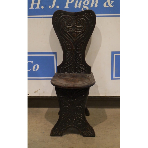 21 - Heavily carved hall chair