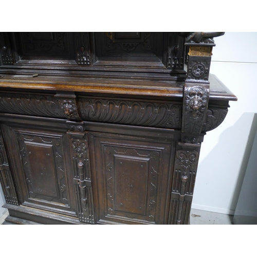 217 - Heavily carved Dutch court cupboard 70x55x24