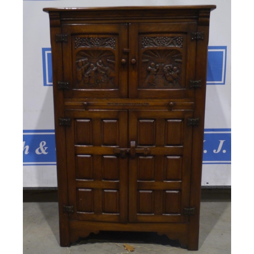 245 - Oak carved front drinks cabinet 55x35