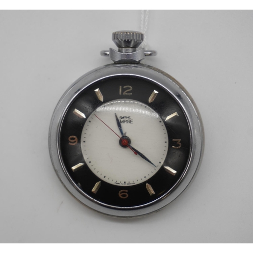 585 - Smiths Empire rare sweep centre seconds hand, black surround on glass with gold coloured numerals