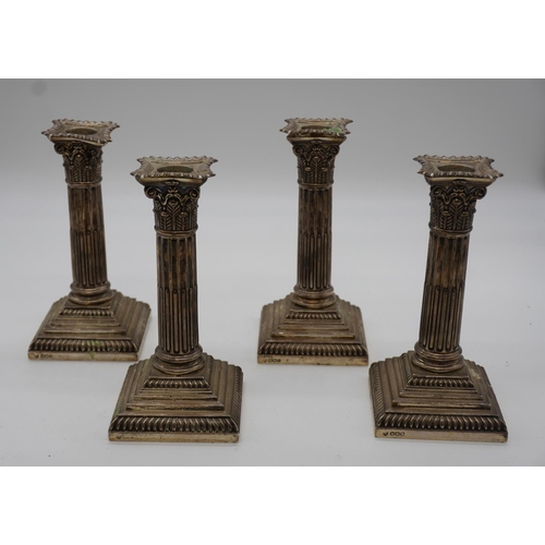 612 - 4 Silver candlesticks, 7