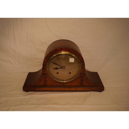 644 - 8 Day wooden striking mantle clock with brass numerals and face, an English movement with key and pe... 
