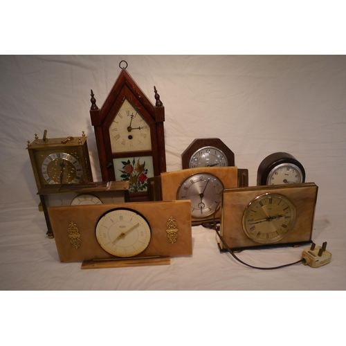 648 - Miscellaneous 1950/60's mantle clocks including 1 brass electric Dominion clock, 2 Metamec brass and... 