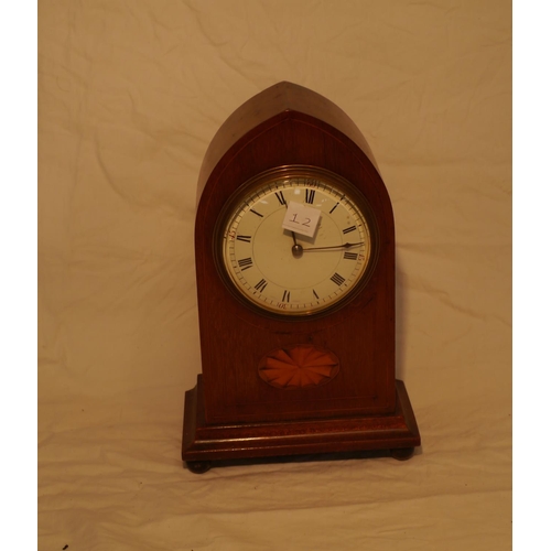 652 - Early Edwardian wood and brass mantle clock with Roman numerals and makers name on the face