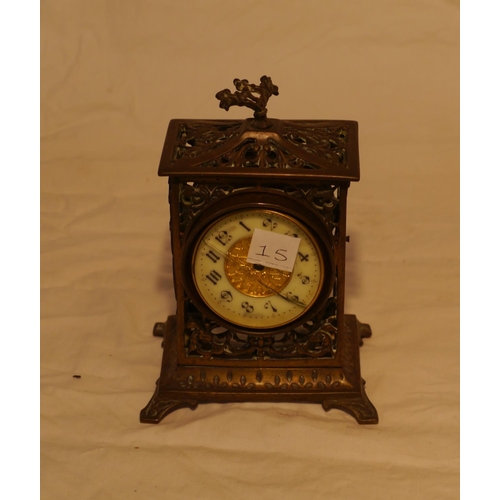 655 - Victorian brass lattice work carriage clock with British Clock Company drum movement and enamel dial