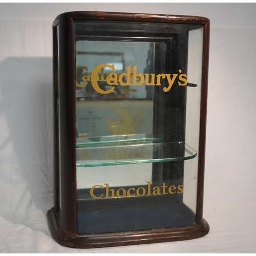 665 - Vintage display cabinet with Cadburys logo, one shelf. Cracked glass on side 16x13