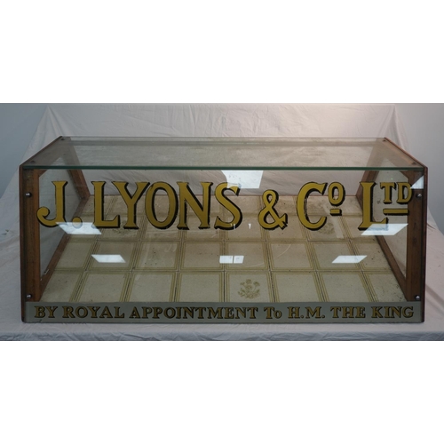 675 - Old glass display cabinet featuring J.Lyons & Co Ltd logo 48x27 1/2