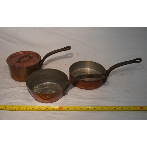 679 - 3 Old copper saucepans