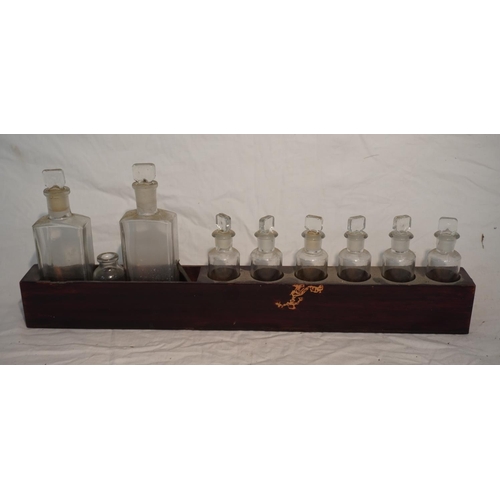 681 - Wooden pack of old pharmaceutical bottles