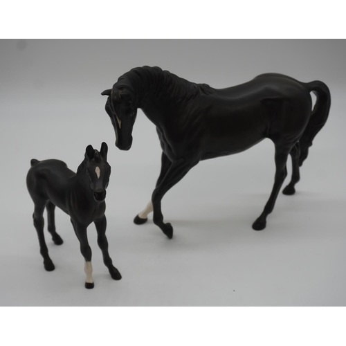 722 - Beswick black beauty with foal