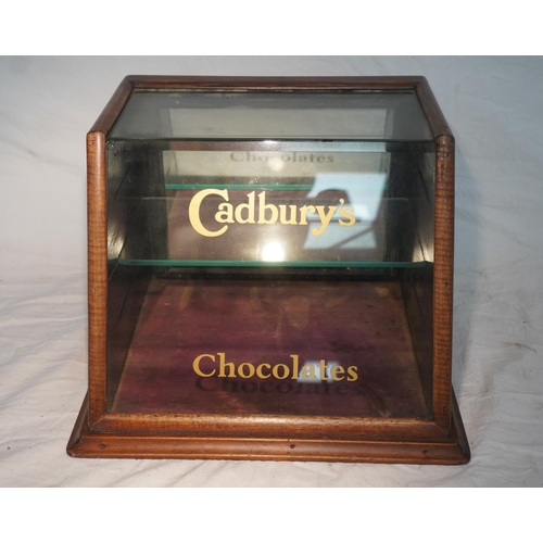 761 - Glass shop display cabinet with Cadburys logo