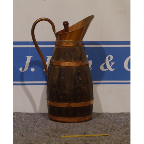 786 - Wooden and copper jug 24