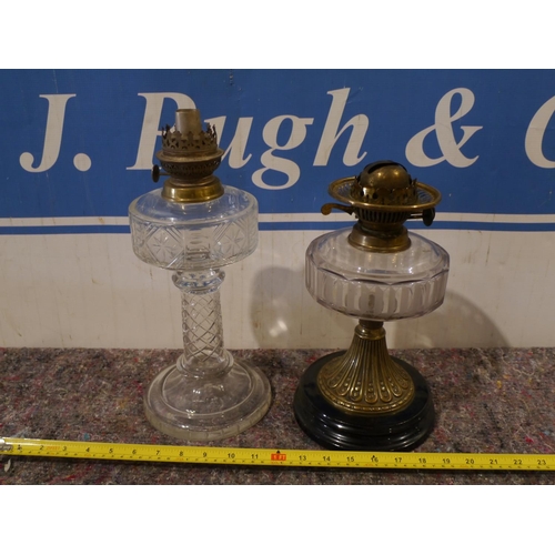 814 - 2 Old glass oil lamps