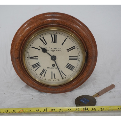 865 - F. Stuart, Hereford wall clock in oak case