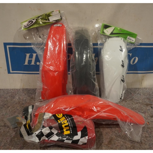 121 - Box of new motocross plastics
