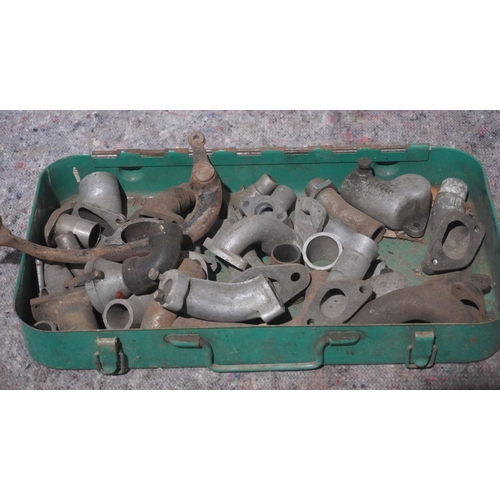 234 - Tray of vintage British motorcycle manifolds