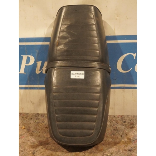 334 - Kawasaki Z200 1980's seat. Good solid original metal base complete with owners manual flap, tool rol... 