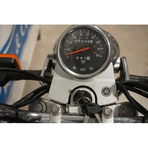 653 - Yamaha 125 motorcycle. 2000. Very low mileage, 12 months MOT 5348 miles. Reg. W247 DWU. V5