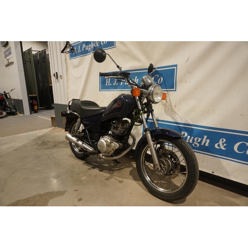 653 - Yamaha 125 motorcycle. 2000. Very low mileage, 12 months MOT 5348 miles. Reg. W247 DWU. V5