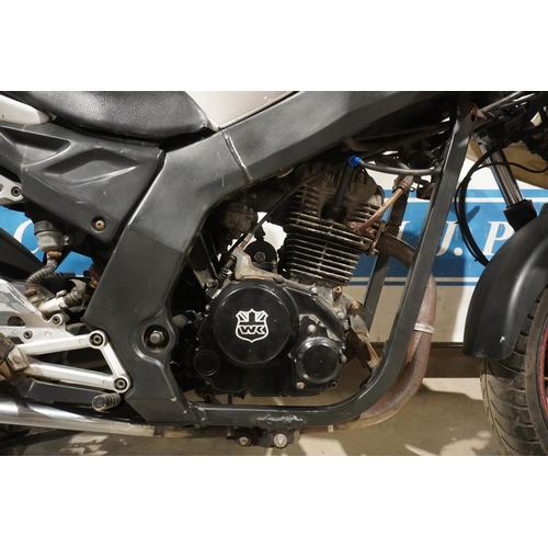 720 - WK125 Sport motorcycle engine. Runs. Reg. SG65 TWD. No docs
