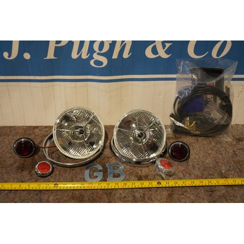 196 - Land Rover Series 1 P700 headlights, reflectors and GB letters